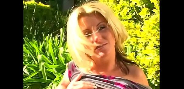  Nasty blonde whore Summer Storm with big jugs is fond of being nailed by her sunburnt friend at the backyard
